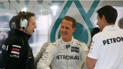 Michael Schumacher, centre, is hoping he and teammate Nico Rosberg can give home fans plenty to smile about at the German Grand Prix in Hockenheim.