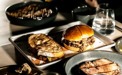 The Fiya picanha burger is smashed on the plancha until it's deliciously crisp on the outside. Photo: Fiya