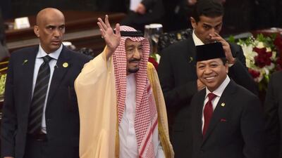 Saudi Arabia's King Salman waves next to Indonesian parliament speaker Setyo Novanto (front right) at the parliament in Jakarta on March 2, 2017. Adek Berry / AFP