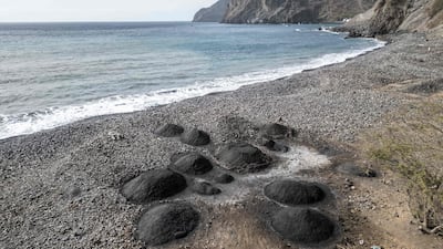 Piles of black sand on a beach depleted by sand mining near Ribeira da Barca, Cape Verde. AFP