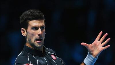 Novak Djokovic hits a forehand in his men's singles final match against Rafael Nadal at the ATP World Tour Finals at London's O2 Arena on November 11, 2013. Clive Brunskill / Getty Images