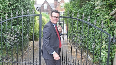Andy Burnham outside his house in Warrington, Cheshire. PA