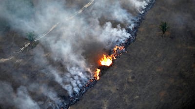 An aerial view shows a fire in an area of the Amazon rainforest near Porto Velho, Brazil. REUTERS
