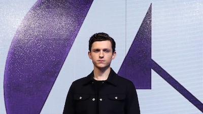 Tom Holland, in a black jacket, T-shirt and trousers, attends a press conference for 'Avengers: Infinity War' in Seoul on April 12, 2018. Getty Images