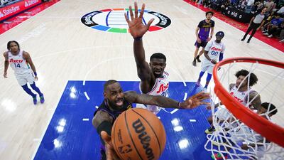 LeBron James of the Los Angeles Lakers attempts a shot against Adem Bona of the Philadelphia 76ers. AP