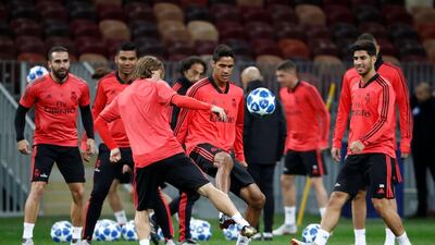 Modric and Raphael Varane during training. Reuters