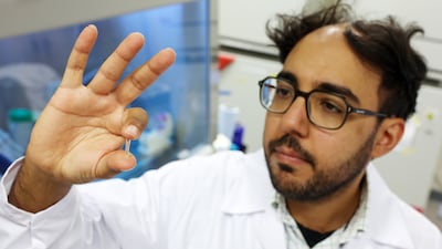 Dr Khalil Ramadi is an assistant professor at NYU Abu Dhabi, with the diminutive invention aiming to boost patient care. Chris Whiteoak / The National
