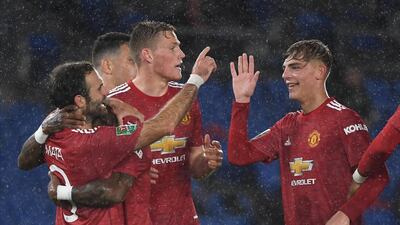 Juan Mata (L) celebrates with his teammates. EPA