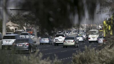 Abu Dhabi commuters are happier than before, says a survey, but distracted drivers are still an issue. Silvia Razgova / The National