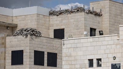 Sand bags line the top of the old Palestinian Authority headquarters in the Jenin camp for refugees, in the occupied West Bank. AFP