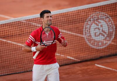 Novak Djokovic celebrates winning the French Open final. Reuters
