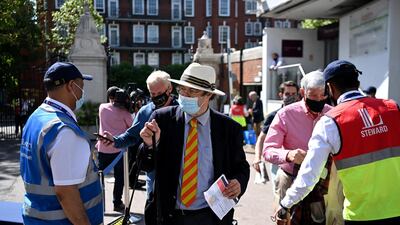 Supporters arrive at Lord's for the opening day of the first Test. Getty