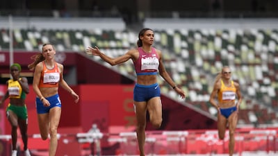 USA's Sydney Mclaughlin wins the women's 400m hurdles final.