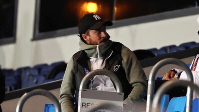 Injured Real Madrid attacker Eden Hazard sits in the stands during the match. EPA