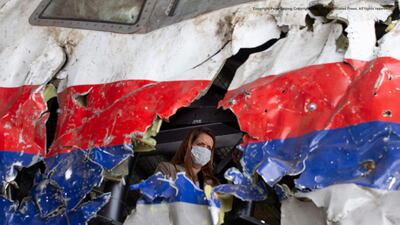 Trial judges and lawyers inspect the reconstructed wreckage of Malaysia Airlines Flight MH17 at the Gilze-Rijen Airbase, southern Netherlands. AFP
