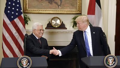 US president Donald Trump shakes hands with Palestinian president Mahmoud Abbas during a joint press conference in the Roosevelt Room of the White House in Washington, DC on May 3, 2017. Olivier Douliery / Pool via Bloomberg