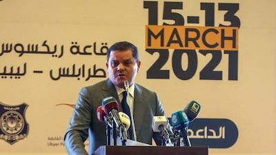 Libya's interim prime minister Abdul Hamid Dbeibah delivers a speech at a national conference on the Covid-19 pandemic, in the capital Tripoli, on March 13, 2021. AFP