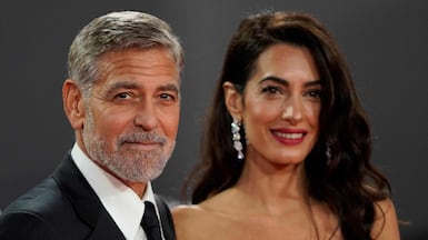 US actor George Clooney and his wife Amal pose on the red carpet in London in 2021. AFP