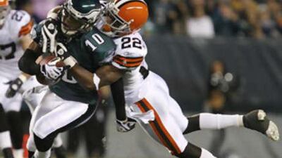 Philadelphia receiver DeSean Jackson is tackled by Cleveland's Brandon McDonald.