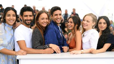 (L-R) Dany Martial, Salim Kechiouche, Lou Luttiau, Shain Boumedine, Meleinda Elasfour, Marie Bernard and Hafsia Herzi attend the photocall for 'Mektoub, My Love: Intermezzo' during the 72nd annual Cannes Film Festival. Photo: Pascal Le Segretain/Getty Images