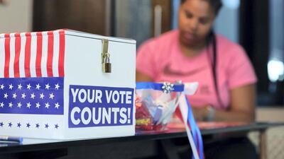 Americans living in the UAE cast their votes in the Democratic primary. Chris Whiteoak / The National