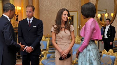 Meeting with former US president Barack Obama and first lady Michelle Obama at Buckingham Palace in London, England, on May 24, 2011. Getty Images