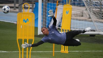 Goalkeeper Keylor Navas saves the ball during the training session. Sergio Perez / Reuters