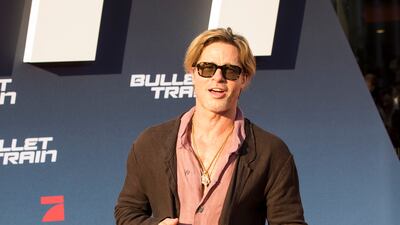 Brad Pitt walks the red carpet. Getty Images