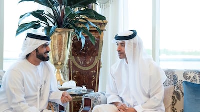 Sheikh Hazza bin Zayed Al Nahyan, Vice Chairman of the Abu Dhabi Executive Council, right, speaks with Majed Ali Al Khateri, left, during a Sea Palace barza. Mohamed Al Hammadi / Crown Prince Court - Abu Dhabi