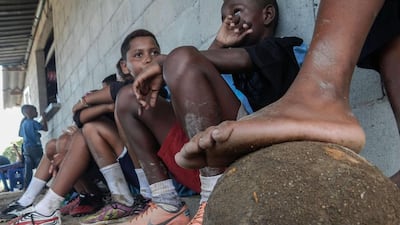 "I contacted camera maker Nikon and the company agreed to contribute 10 waterproof Coolpix cameras. In the Cidade de Deus, the City of God, one of the most infamous Rio favelas, I knew a certain Tony Barros, who was running a photo shop. I had met him through Nadine Gonzalez, a friend who set up a group called Modafusion that runs a fashion institute in the favela. Tony immediately became my greatest ally, and my passport to the neighborhood. He recruited the kids who were to accompany us for three-and-a-half months, and he opened all the doors plus got us out of a few hairy situations. Almost every weekend between February and May 2013 Tony and I went out with groups of three to 10 children between 10 and 15 years old. Each of them got a camera and was tasked with shooting pictures about football. The sessions usually lasted three to four hours, but could sometimes go on all day. Severita / AFP