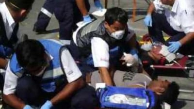 Paramedics attend to people acting as casualties during a mass fire drill at Dubai Healthcare City yesterday.
