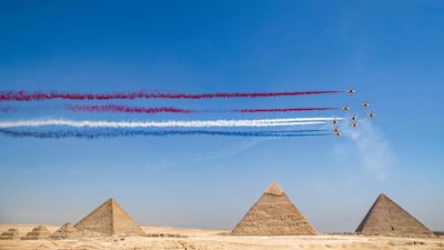 The Egyptian Air Force Silver Stars aerobatic team perform during the Pyramids Air Show 2022. Photos: AFP and Reuters