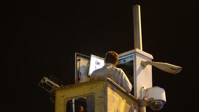 A police officer checks security cameras. Security camera footage widely circulated on social media appeared to capture two of the blasts. In one clip a huge ball of flame erupts at an entrance to the terminal building, scattering terrified passengers. Osman Orsal / Reuters