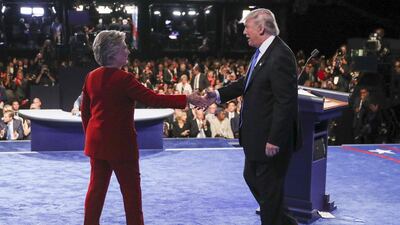 Democratic presidential nominee Hillary Clinton shakes hands with Republican presidential nominee Donald Trump. Joe Raedle / Pool via AP