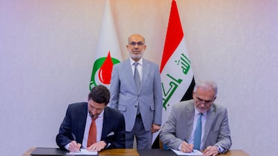 Bassim Khudair, Iraq's Minister of Oil, oversees the signing of a deal with Chevron to exchange data on the West Qurna 2 oilfield in Basra province. Photo: Iraqi Oil Ministry