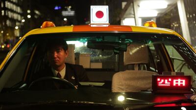 It takes just a few seconds to hail a cab in Japan. Uber is hoping to break into the lucrative market.Taro Karbie/AFP