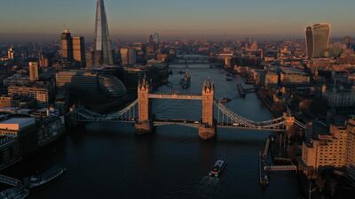 London's Tower Bridge, spanning the Thames, at sunrise. AFP