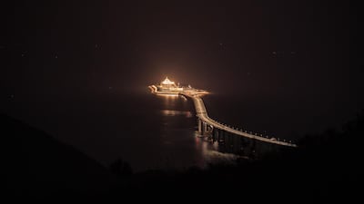 An evening view of the Hong Kong-Zhuhai-Macau bridge and its entrances to a cross sea tunnel. EPA