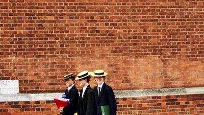 Students from Harrow school move between classes in London, England. Getty