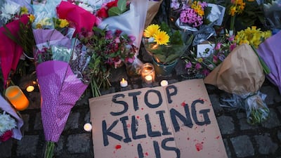 A sign at a memorial site in Clapham Common bandstand, London. The murder of Sarah Everard has highlighted issues of violence against women. Reuters