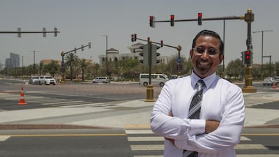 For two years, Hassan Al Jabri, who is an Abu Dhabi traffic safety ambassador, used to make a 220km round-trip to his office at Ibn Battuta Gate in Dubai from his home in Abu Dhabi. Mona Al-Marzooqi / The National