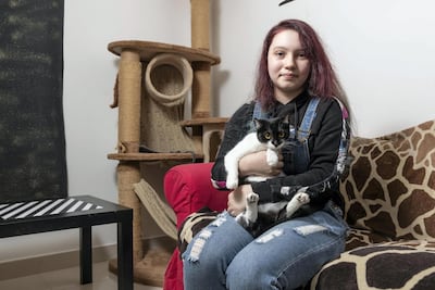 Laura Maria, 16, has been feeding and rescuing cats with her mum's help since she was 11. Antonie Robertson/The National