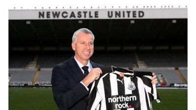 Alan Pardew may feel the empty seats at St James' Park reflect the number of fans who wanted him as Newcastle's new manager. Scott Heppell / AP Photo