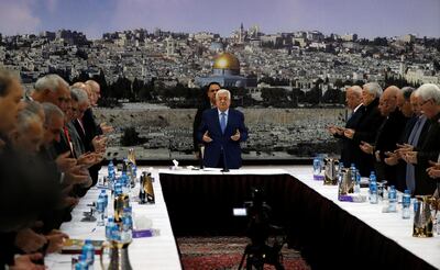 Palestinian President Mahmoud Abbas prays at the start of a meeting with his leadership in Ramallah. Reuters