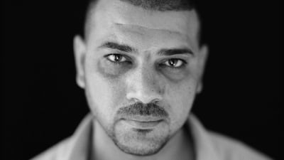 Detained for seven months until May 2006, this prisoner served in the Iraqi military, and was interrogated two to three times a day. He was stripped naked and tied to a door. 'They brought the dogs to us.' Chris Bartlett