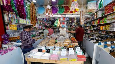 People shop ahead of Ramadan, at a wholesale market in Baghdad, Iraq Reuters
