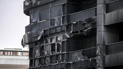 Pictures taken on May 28, 2018 show the damage in the immediate aftermath of the blaze. More than 100 residents fled the fire and the building has been empty since. Reem Mohammed / The National
