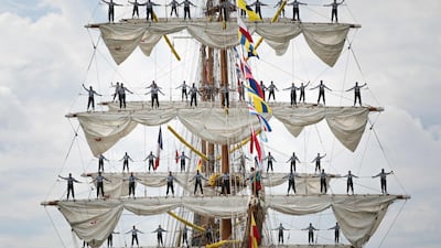 Sailors stand on the sails of the Cuauhtemoc as the ship leaves Rouen, France, during the Big Parade at the end of the Armada 2023 event. AFP