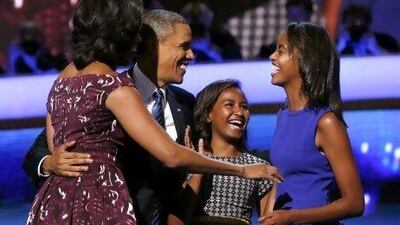 Barack Obama is joined on stage by his family at the conclusion of his address to the final session of the Democratic National Convention in Charlotte, North Carolina. In his speech, the US president criticised his rival for lacking experience in the foreign policy fold.