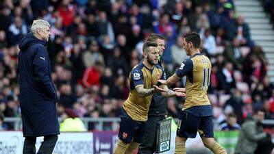 Jack Wilshere of Arsenal replaces Mesut Ozil. Jan Kruger/Getty Images